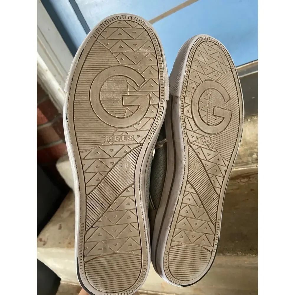 G by Guess Opall 12 mid-top 2 tone sneakers w/ faux-snakeskin pattern.